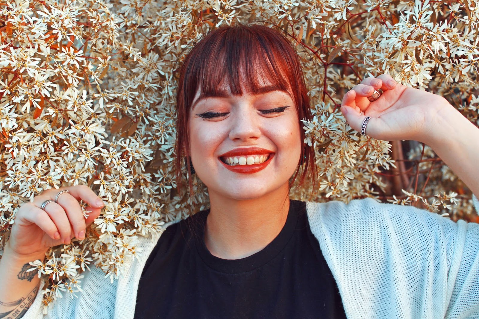 Smiling woman with flowers
